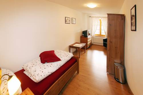 Imagen de la habitación del Hotel Penzion U Chodsk&eacute;ho Hradu. Foto 9