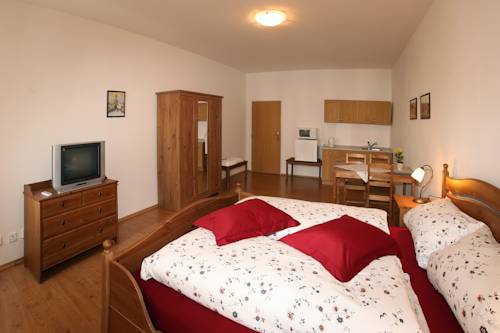 Imagen de la habitación del Hotel Penzion U Chodsk&eacute;ho Hradu. Foto 10