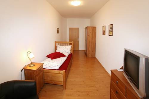 Imagen de la habitación del Hotel Penzion U Chodsk&eacute;ho Hradu. Foto 16