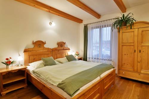 Imagen de la habitación del Hotel Penzion U Křiv&eacute;ho Psa. Foto 3