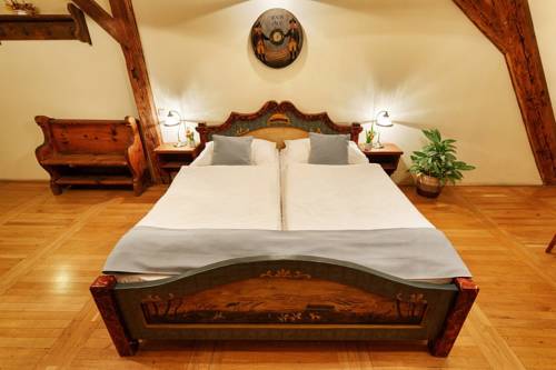 Imagen de la habitación del Hotel Penzion U Křiv&eacute;ho Psa. Foto 4
