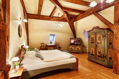 Imagen de la habitación del Hotel Penzion U Křiv&eacute;ho Psa. Foto 10