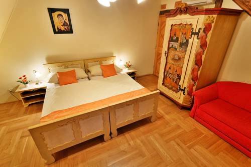Imagen de la habitación del Hotel Penzion U Křiv&eacute;ho Psa. Foto 11