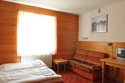 Imagen de la habitación del Hotel Penzion U Kotle. Foto 3