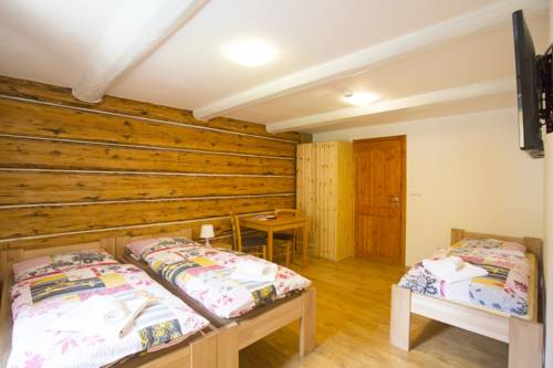 Imagen de la habitación del Hotel Penzion U Vyhl&iacute;dky. Foto 11