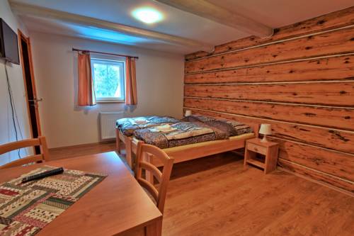 Imagen de la habitación del Hotel Penzion U Vyhl&iacute;dky. Foto 16