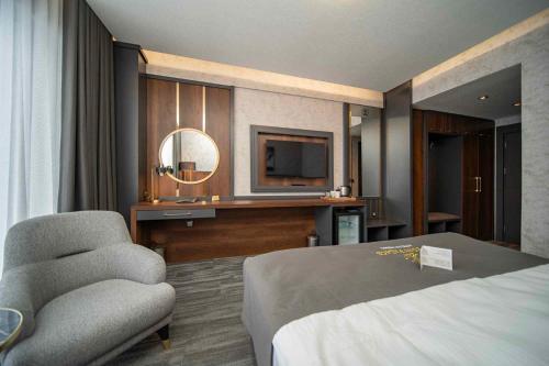 Imagen de la habitación del Hotel Peony Palace Resort. Foto 20