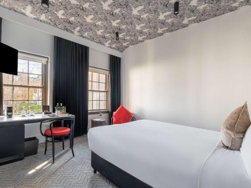 Imagen de la habitación del Hotel Peppers Gallery. Foto 9