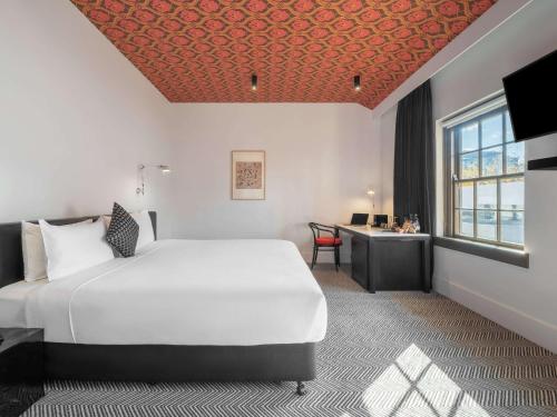 Imagen de la habitación del Hotel Peppers Gallery. Foto 11