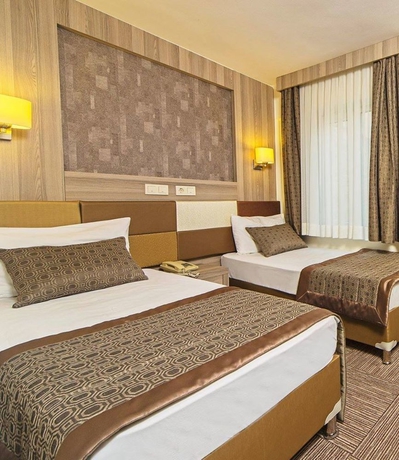 Imagen de la habitación del Hotel Pera Arya. Foto 4