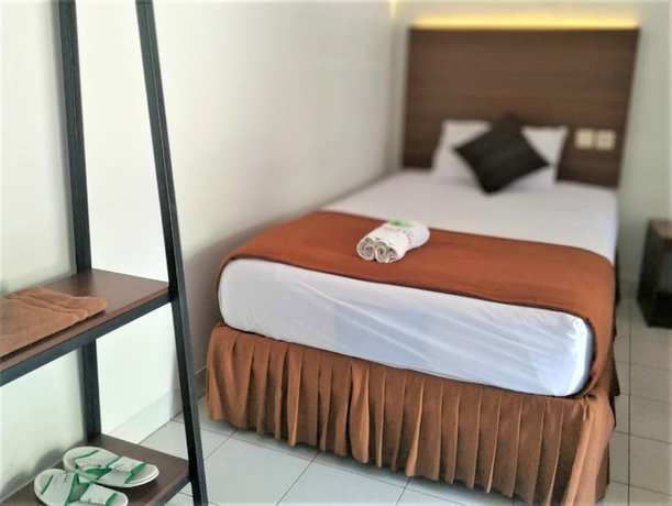 Imagen de la habitación del Hotel Perdana. Foto 5