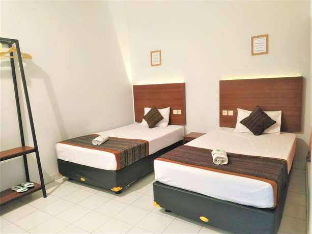 Imagen de la habitación del Hotel Perdana. Foto 9