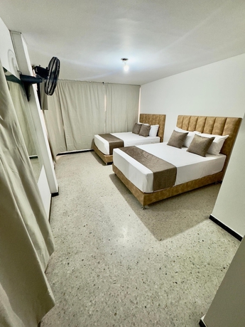 Imagen de la habitación del Hotel Pereira Central. Foto 7