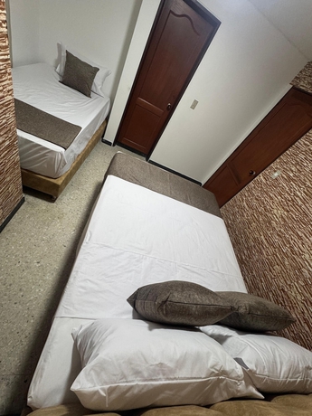 Imagen de la habitación del Hotel Pereira Central. Foto 10