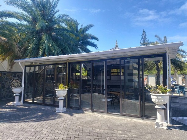 Imagen del bar/restaurante del Hotel Pereybere Beachside Apartment. Foto 9