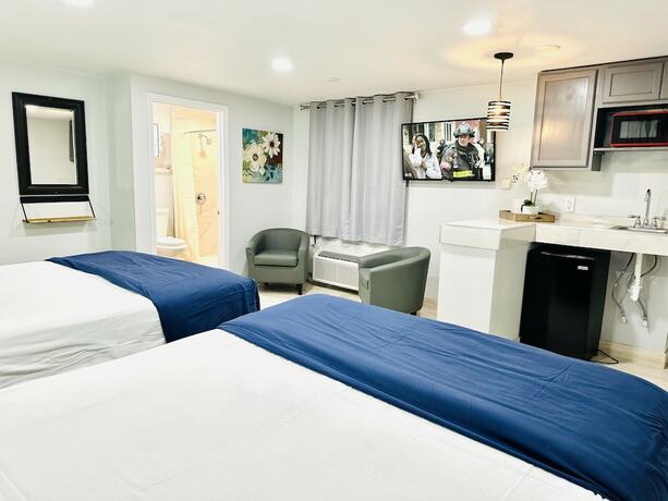 Imagen de la habitación del Hotel Perfect Inn Motel. Foto 15