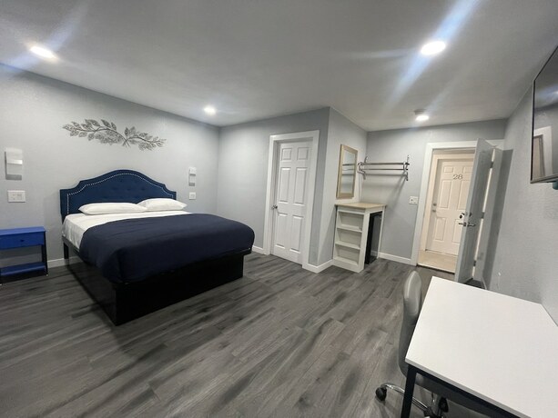 Imagen de la habitación del Hotel Perfect Inn Motel. Foto 17