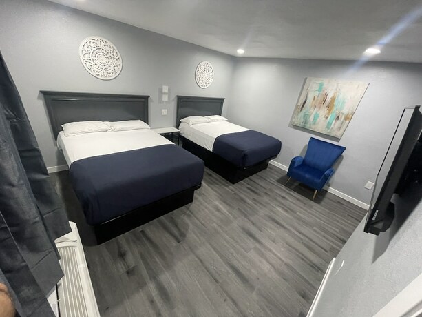 Imagen de la habitación del Hotel Perfect Inn Motel. Foto 18