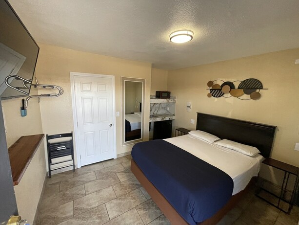 Imagen de la habitación del Hotel Perfect Inn Motel. Foto 19