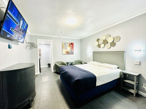 Imagen de la habitación del Hotel Perfect Inn Motel. Foto 20