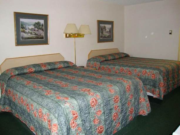 Imagen de la habitación del Hotel Perfect Inns And Suites. Foto 4