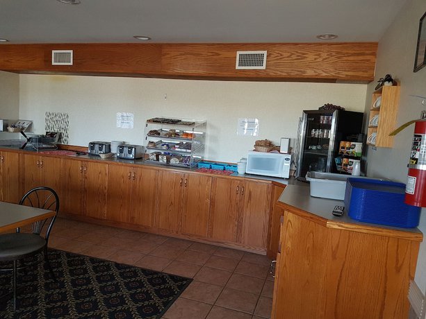 Imagen del bar/restaurante del Hotel Perfect Inns And Suites. Foto 3