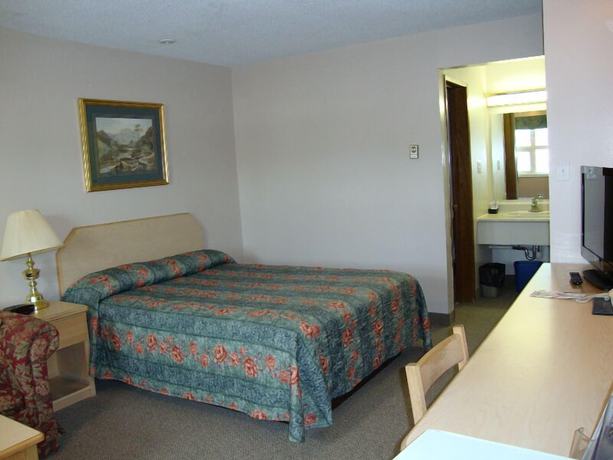 Imagen de la habitación del Hotel Perfect Inns And Suites. Foto 5