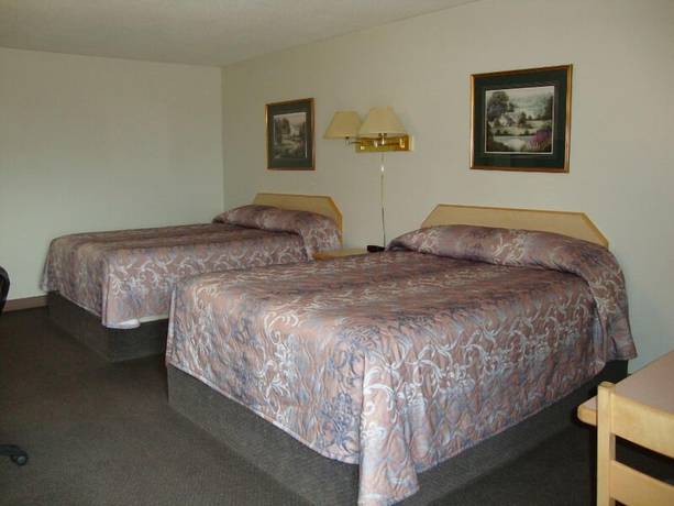 Imagen de la habitación del Hotel Perfect Inns And Suites. Foto 7