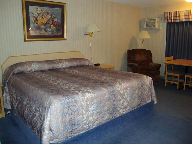 Imagen de la habitación del Hotel Perfect Inns And Suites. Foto 8