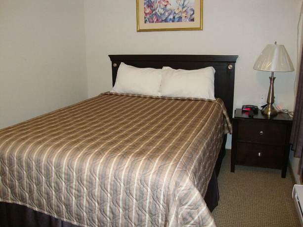 Imagen de la habitación del Hotel Perfect Inns And Suites. Foto 9