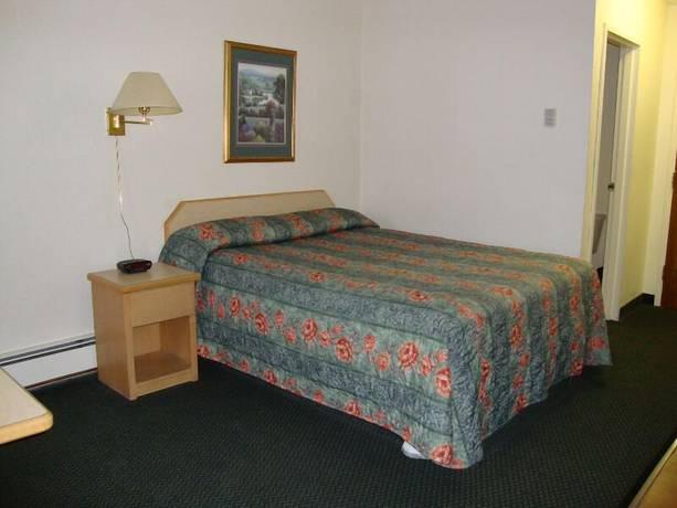 Imagen de la habitación del Hotel Perfect Inns And Suites. Foto 10