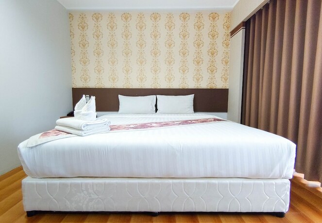 Imagen de la habitación del Hotel Perfectroom Mansion. Foto 16