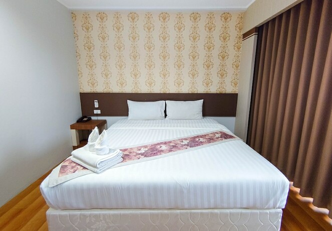 Imagen de la habitación del Hotel Perfectroom Mansion. Foto 20