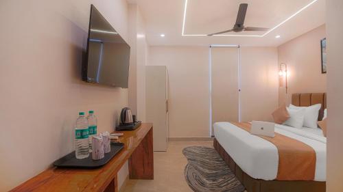 Imagen de la habitación del Hotel Perfectstayz premium Varanasi. Foto 18