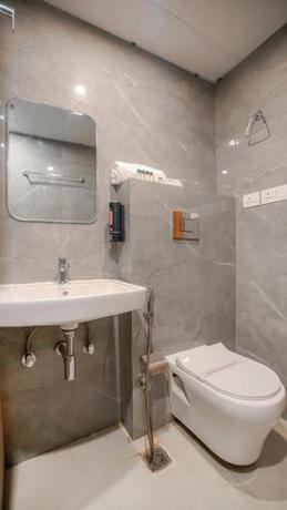 Imagen de la habitación del Hotel Perfectstayz premium Varanasi. Foto 20