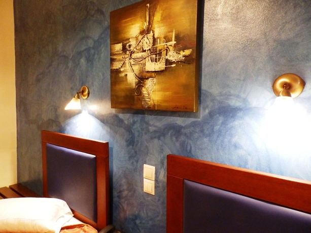 Imagen de la habitación del Hotel Pergamos. Foto 10