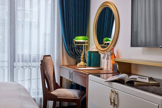 Imagen de la habitación del Hotel Peridot Grand Luxury Boutique. Foto 3