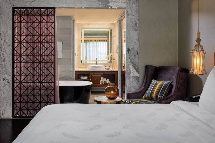 Imagen de la habitación del Hotel Peridot Grand Luxury Boutique. Foto 7