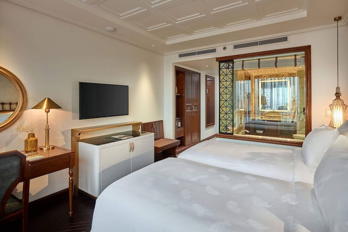 Imagen de la habitación del Hotel Peridot Grand Luxury Boutique. Foto 11