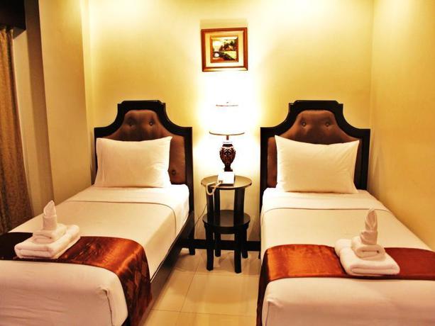 Imagen de la habitación del Hotel Peridot Suites. Foto 3