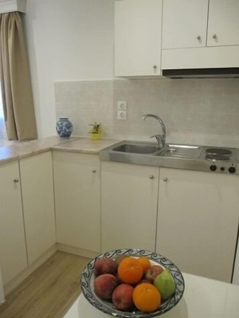 Imagen de la habitación del Hotel Perigiali. Foto 16