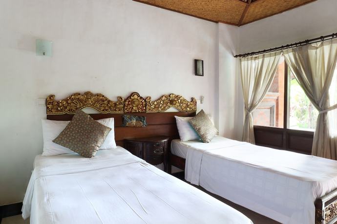 Imagen de la habitación del Hotel Pering Bungalow. Foto 2