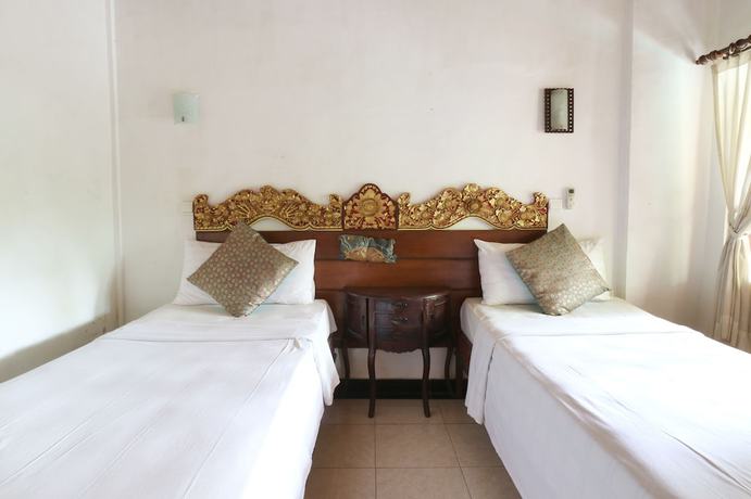 Imagen de la habitación del Hotel Pering Bungalow. Foto 4
