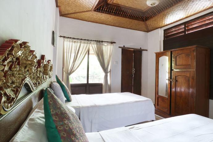 Imagen de la habitación del Hotel Pering Bungalow. Foto 8