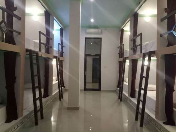 Imagen de la habitación del Hotel Pering Bungalow. Foto 12