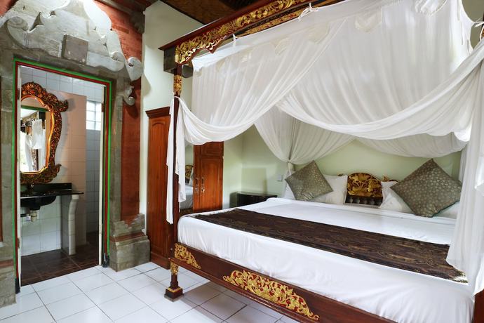 Imagen de la habitación del Hotel Pering Bungalow. Foto 13
