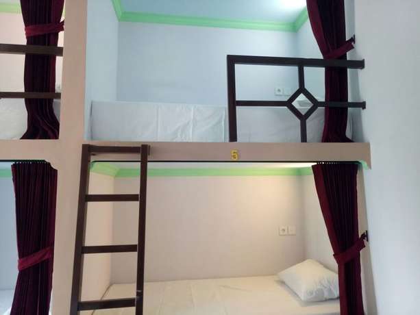 Imagen de la habitación del Hotel Pering Bungalow. Foto 18