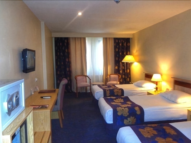 Imagen de la habitación del Hotel Perissia and Convention Center. Foto 4