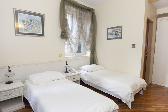 Imagen de la habitación del Hotel Peristil. Foto 11