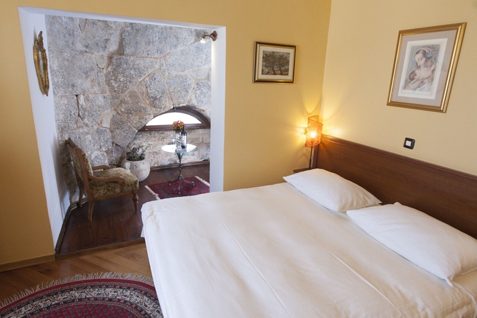 Imagen de la habitación del Hotel Peristil. Foto 19